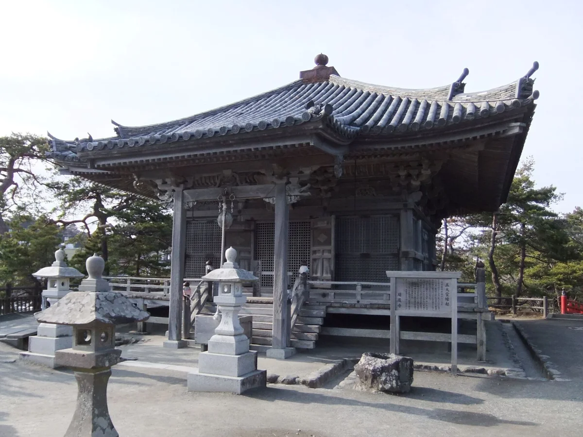The carved wooden Godaido hall seen up close on a Sendai Matsushima half-day private tour